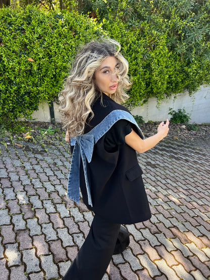 Gilet over con dettagli in jeans
