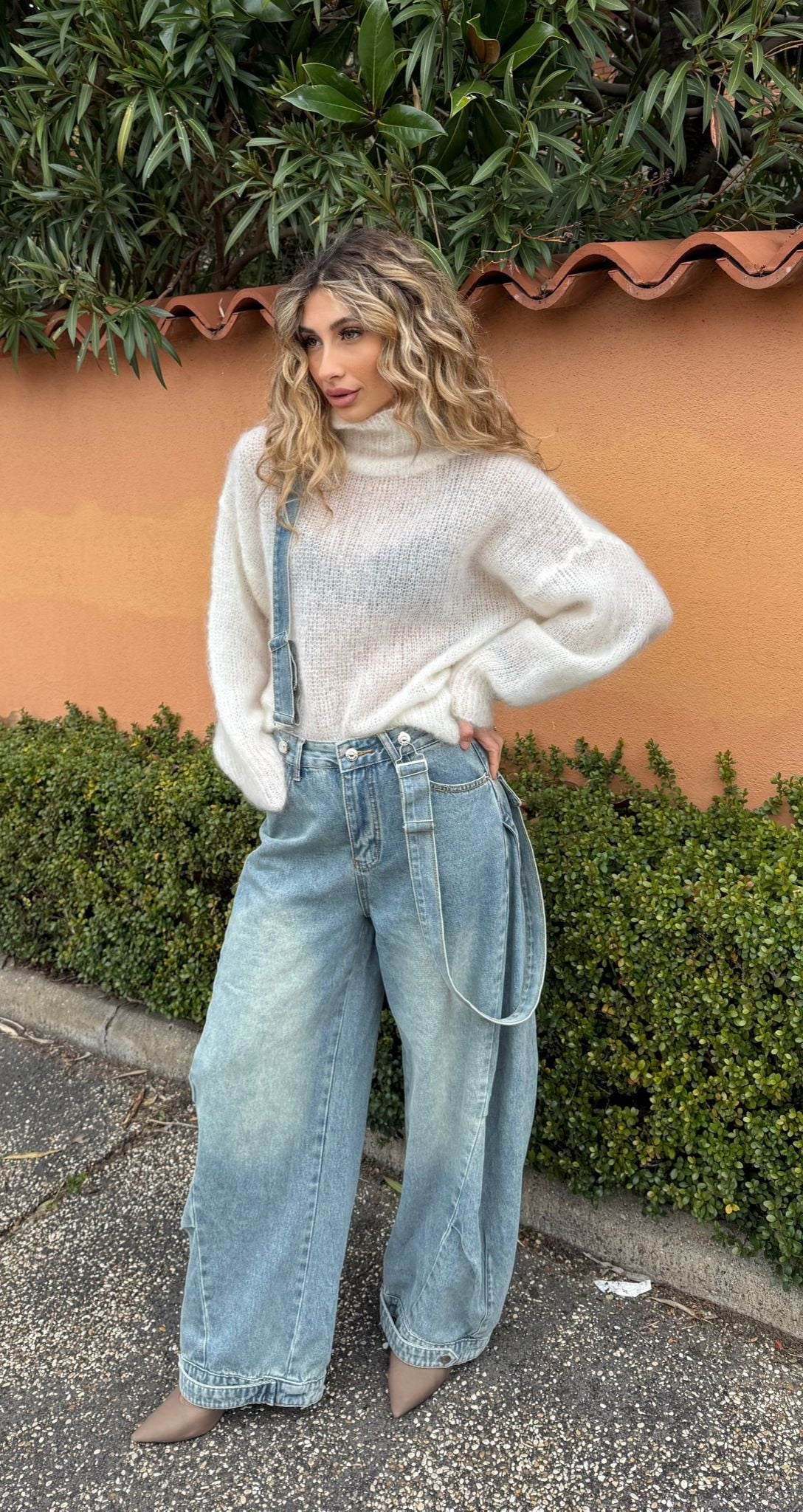 Jeans con straccali
