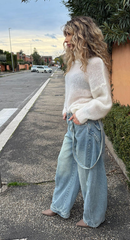 Jeans con straccali