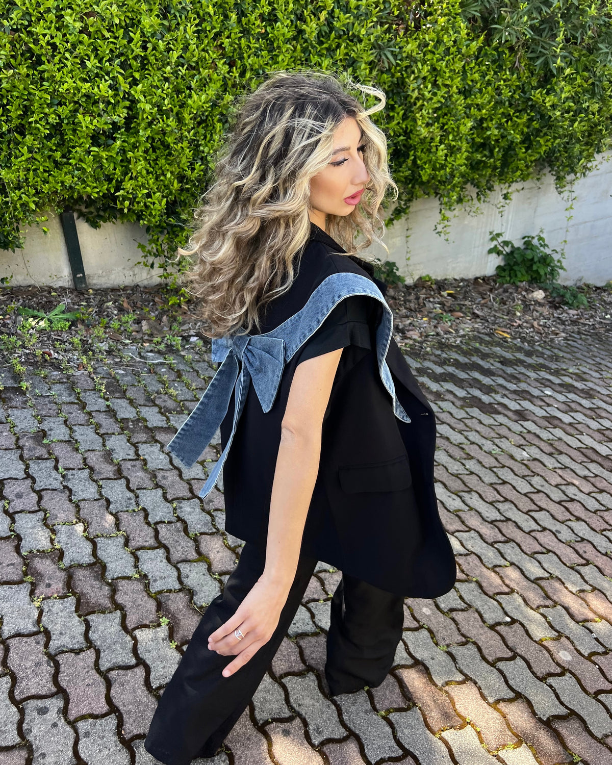 Gilet over con dettagli in jeans